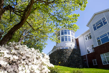 Sanford upper school building in springtime