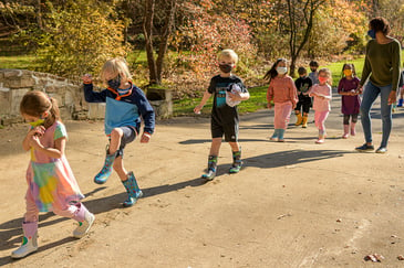 Kindergarten students enjoy a walk outdoors